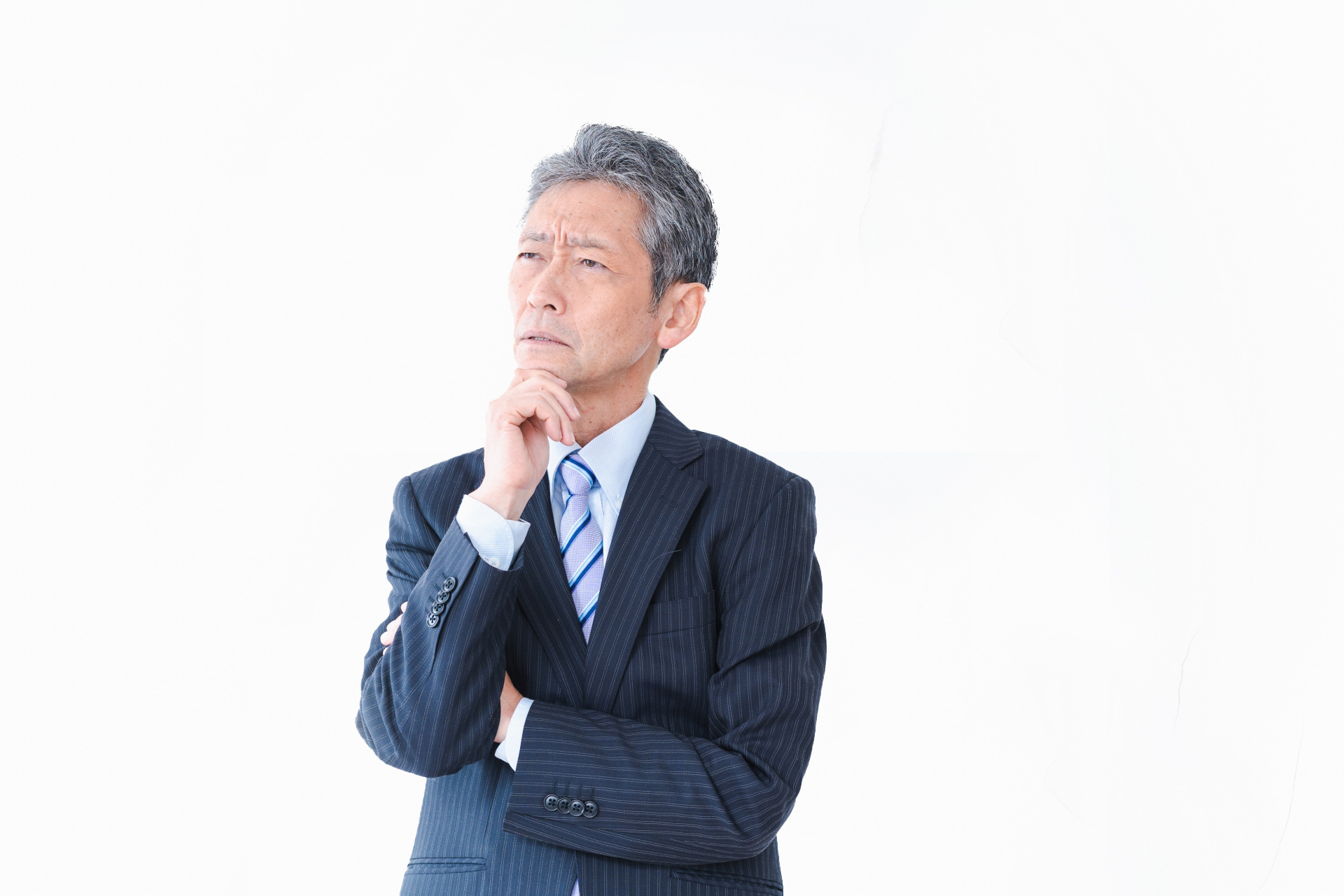 悩む経営者